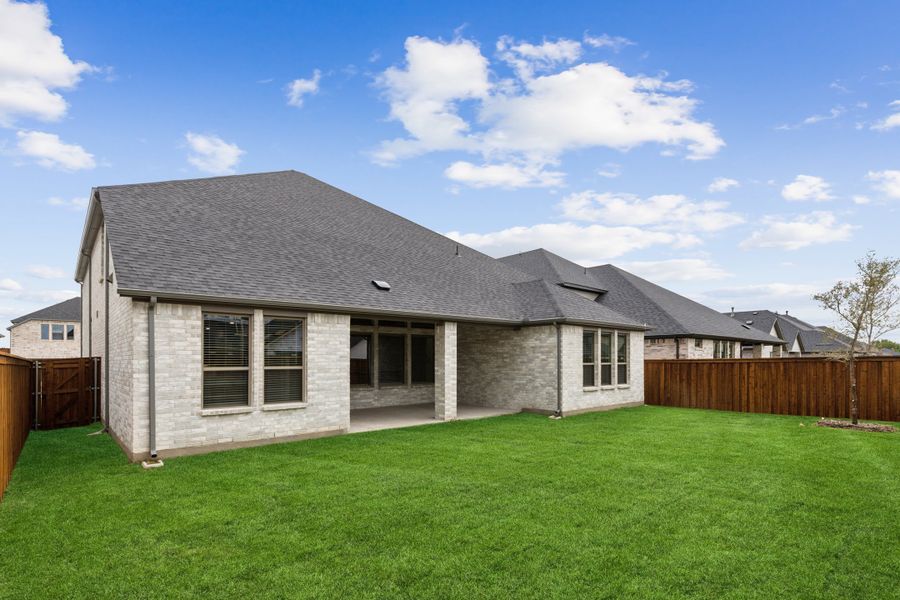 Covered Patio in the Presley II home plan by Trophy Signature Homes – REPRESENTATIVE PHOTO