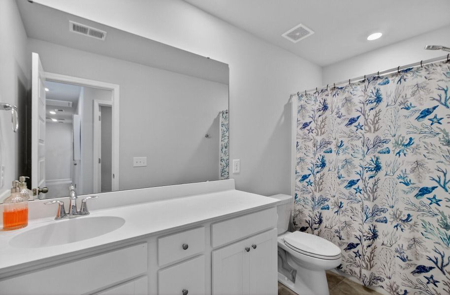 Furnished interior view inside a new home in Limehouse Village: Arbor Series, Summerville (Image 30). Furnished interior view inside a new home in Limehouse Village: Arbor Series, Summerville (Image 30).