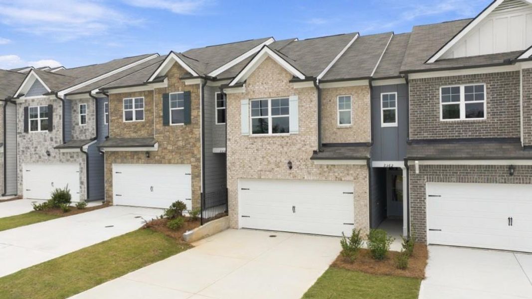 Front exterior of a new home in Carlton, Douglasville, GA, highlighting curb appeal (Image 2).