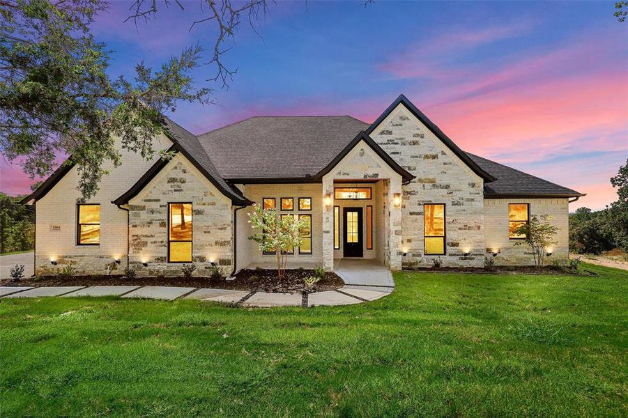 Front exterior of a new home in , Weatherford, TX, highlighting curb appeal (Image 19).