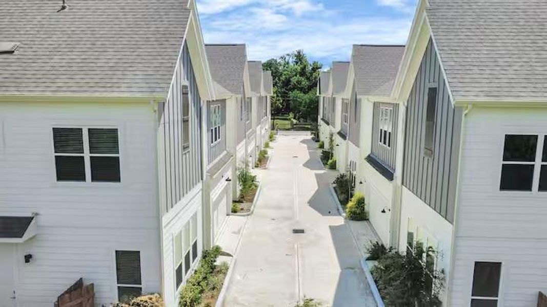 Enjoy a private residential setting tucked away from the main street, with a dedicated drive providing access to the surrounding homes.