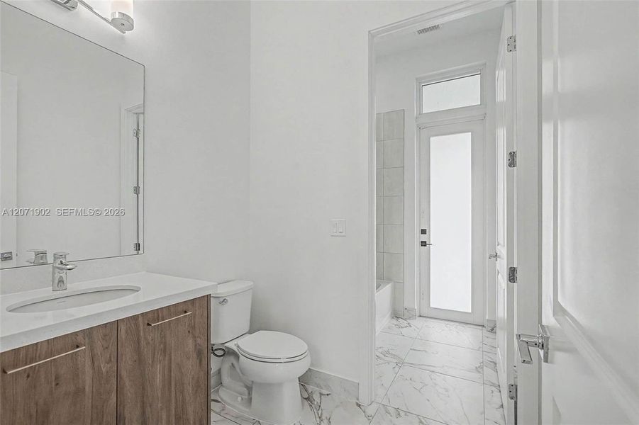 Furnished interior view inside a new home in , Davie (Image 18).