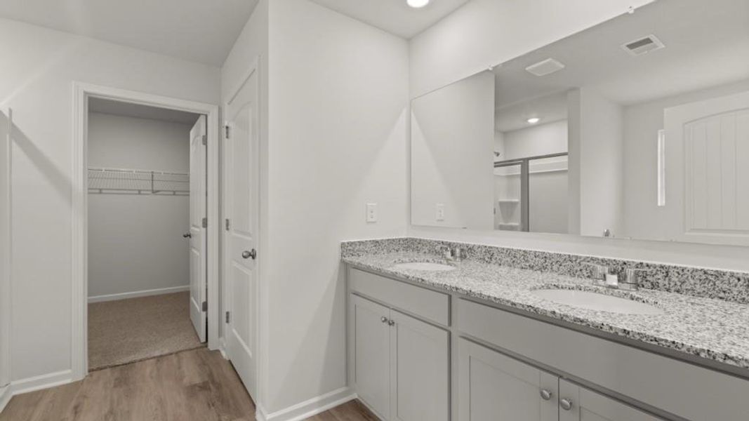 Furnished interior view inside a new home in Northwoods at Mirror Lake, Villa Rica (Image 6).
