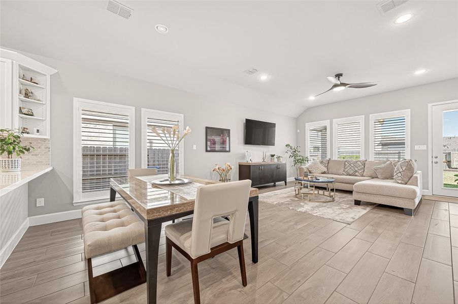 These elegant plantation shutters add a sophisticated touch while making the entire space feel bright and airy. (Note: Photo is staged; property is currently vacant.) These elegant plantation shutters add a sophisticated touch while making the entire space feel bright and airy. (Note: Photo is staged; property is currently vacant.)