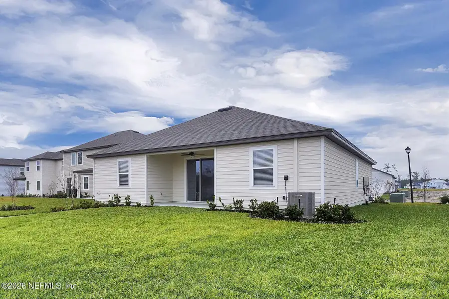 Exterior details and patio area of a home in Jennings Farm, Middleburg (Image 3).