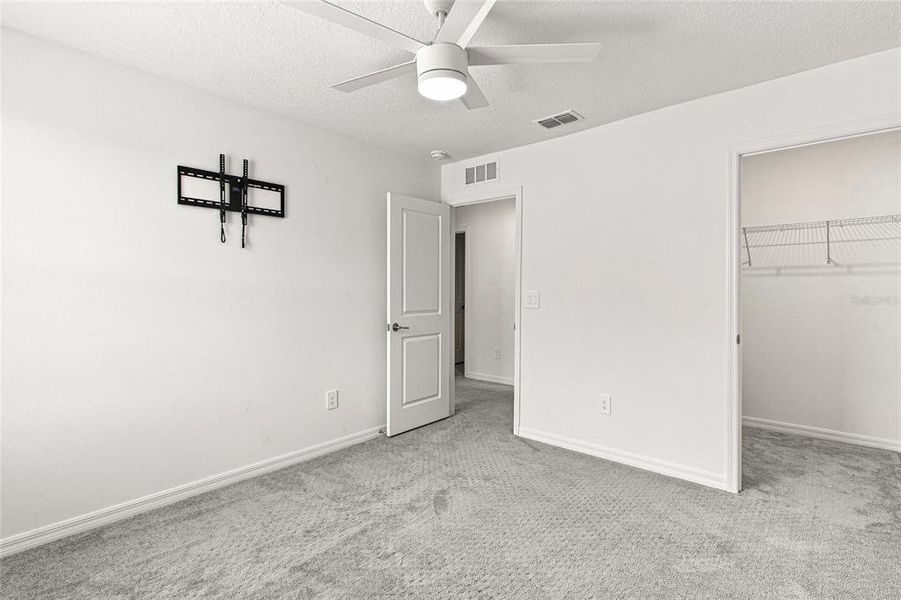 Spacious, unfurnished interior of a new home in The Isle of Avalon, Spring Hill (Image 21).