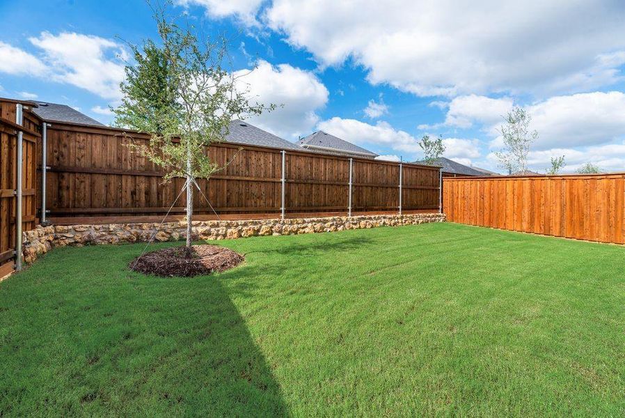Exterior details and patio area of a home in Spiritas Ranch, Little Elm (Image 4). Exterior details and patio area of a home in Spiritas Ranch, Little Elm (Image 4).