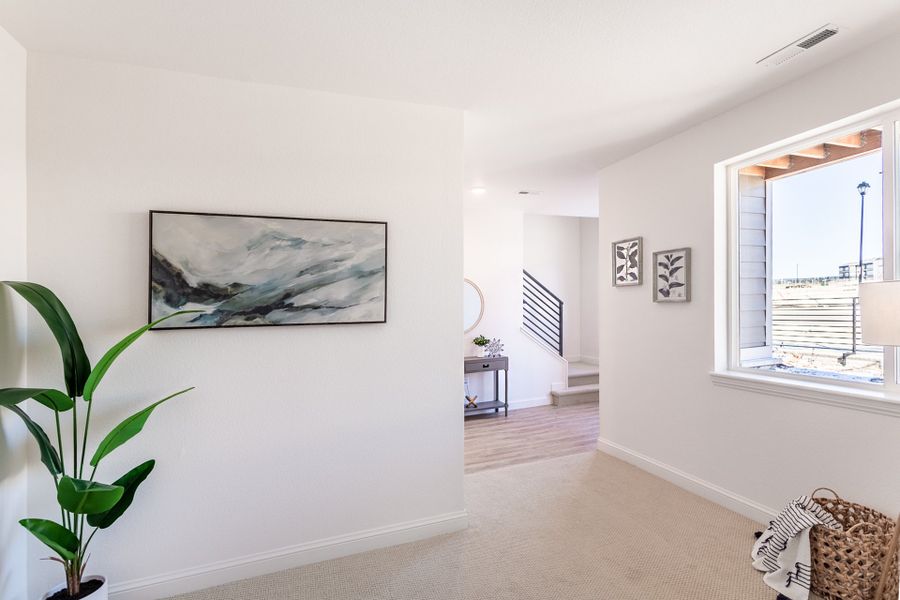 Representative furnished interior of a home built from the Tristyn by Lokal Homes in Victory Ridge, Colorado Springs (Image 8).