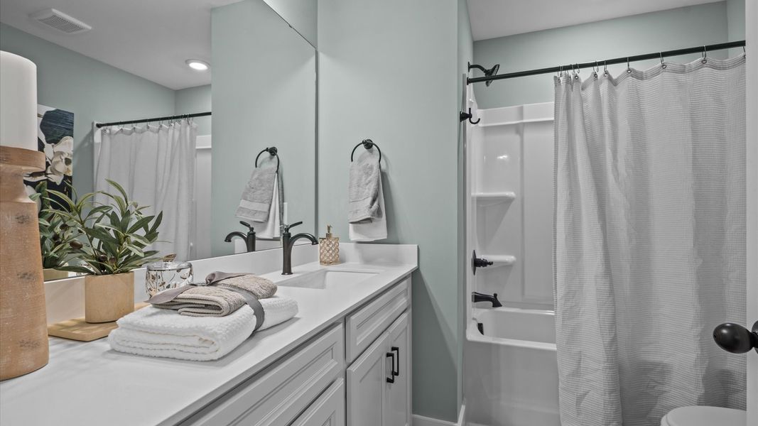 Representative furnished interior of a home built from the Corner Litchfield by DRB Homes in Gresham Station, Simpsonville (Image 19).