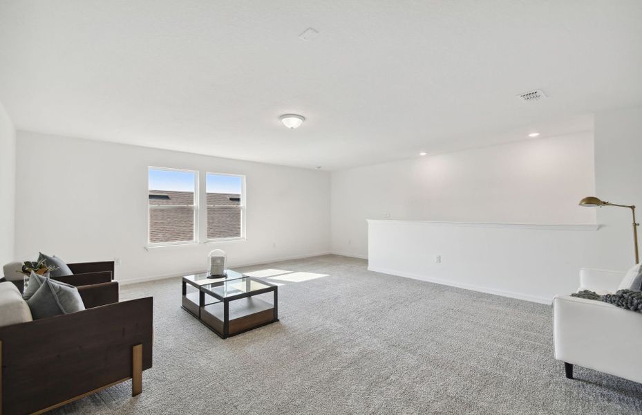 Furnished interior view inside a new home in Oakfield Lakes, Parrish (Image 3).