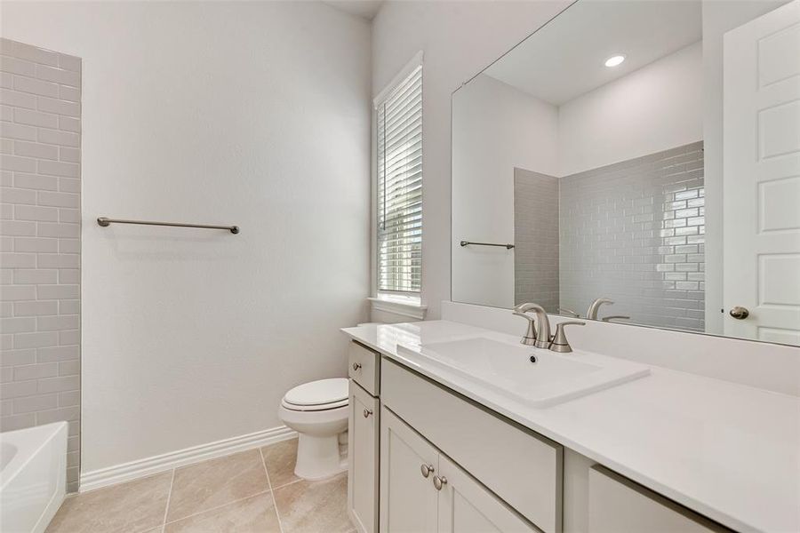 Furnished interior view inside a new home in Wade Settlement Townhomes, Frisco (Image 6).