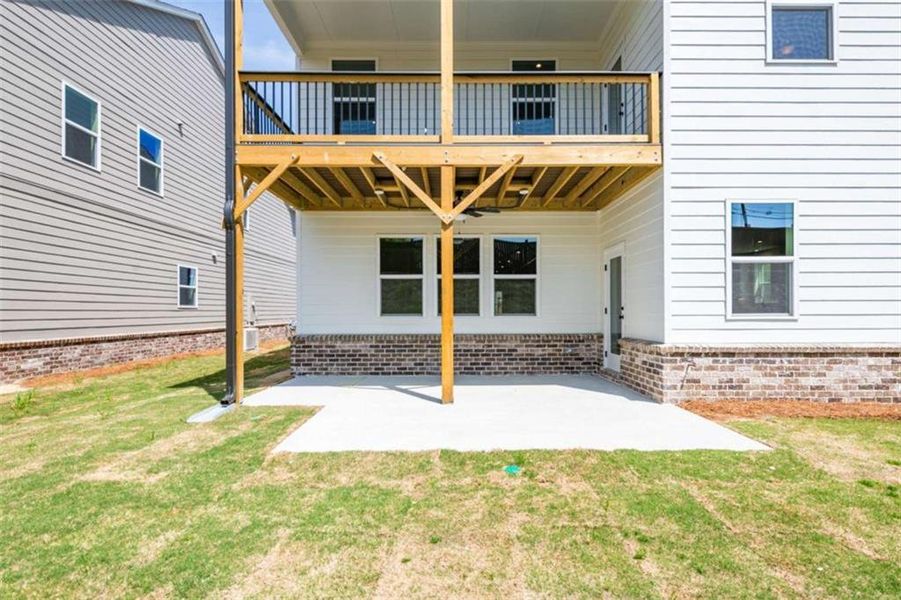 Exterior details and patio area of a home in The Paddocks at Doc Hughes, Buford (Image 18).