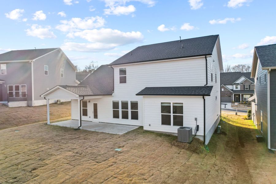 Exterior details and patio area of a home in Forest Creek, Waxhaw (Image 26).