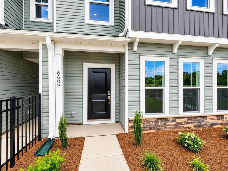 Exterior details and patio area of a home in Westwood Reserve, Charlotte (Image 4). Exterior details and patio area of a home in Westwood Reserve, Charlotte (Image 4).