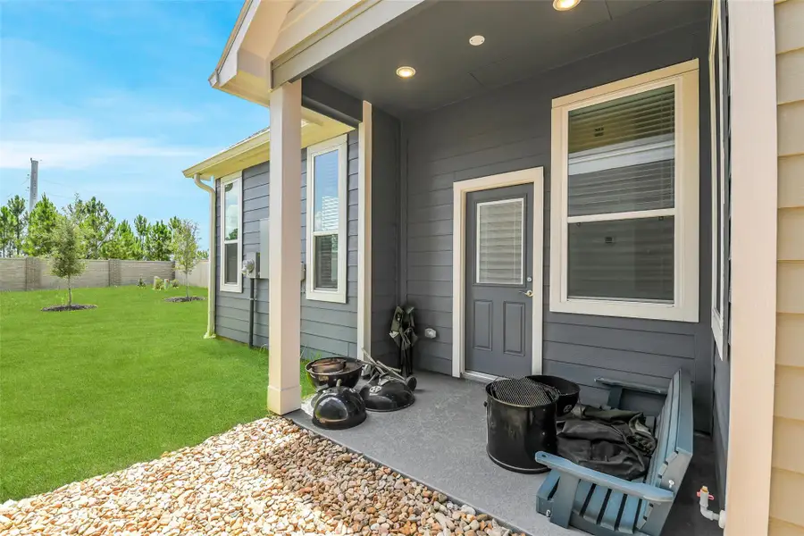 Exterior details and patio area of a home in , Cypress (Image 4).