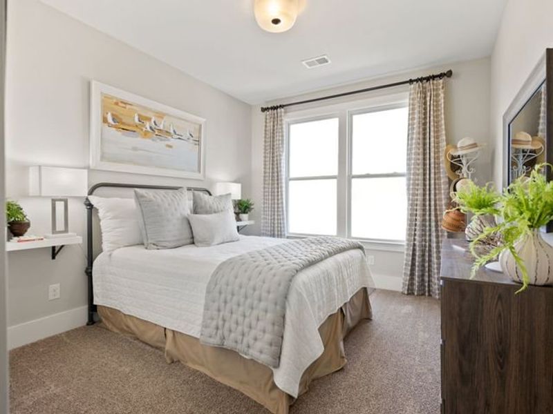 Representative furnished interior of a home built from the Riley P by True Homes in Homecoming, Ravenel (Image 13).