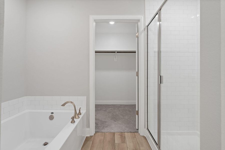 Furnished interior view inside a new home in Sunterra, Katy (Image 18).