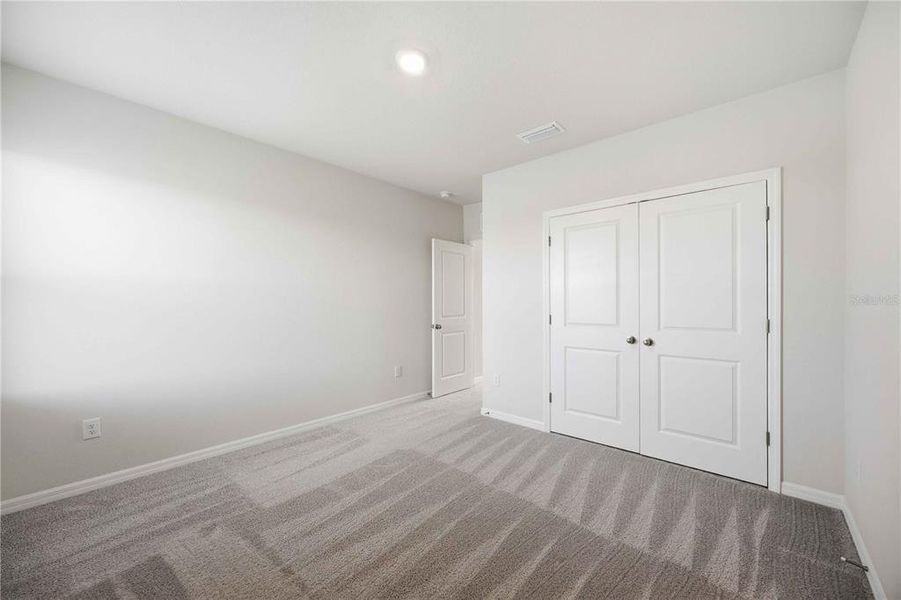 Spacious, unfurnished interior of a new home in Coddington, Bradenton (Image 50).