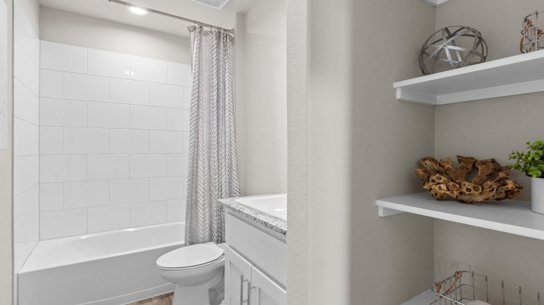 Representative furnished interior of a home built from the FARGO by D.R. Horton in Homestead at Parks Bell Ranch, Odessa (Image 22).