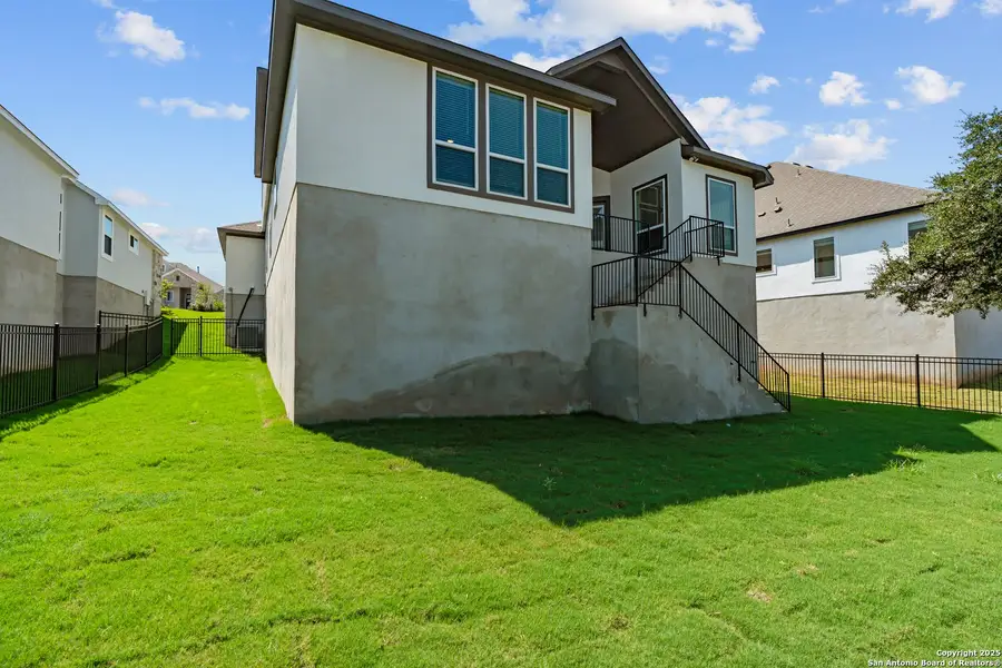 Front exterior of a new home in Esperanza – New Phase Now Selling, Boerne, TX, highlighting curb appeal (Image 1). Front exterior of a new home in Esperanza – New Phase Now Selling, Boerne, TX, highlighting curb appeal (Image 1).