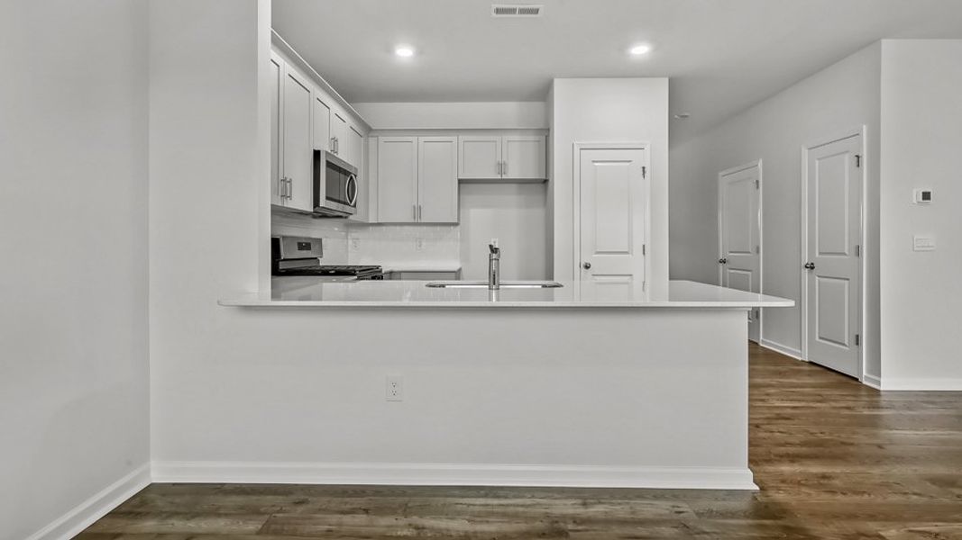 Furnished interior view inside a new home in Clock Road Townhomes, New Bern (Image 7).