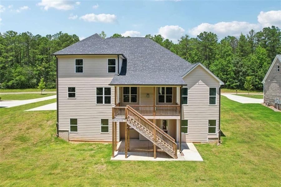 Front exterior of a new home in Whitestone, Douglasville, GA, highlighting curb appeal (Image 12).