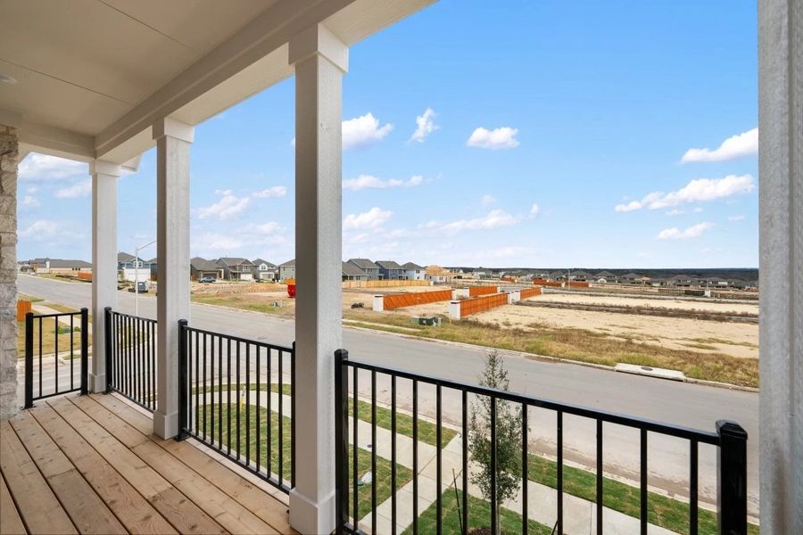 Exterior details and patio area of a home in The Cottages at Lariat, Liberty Hill (Image 3).