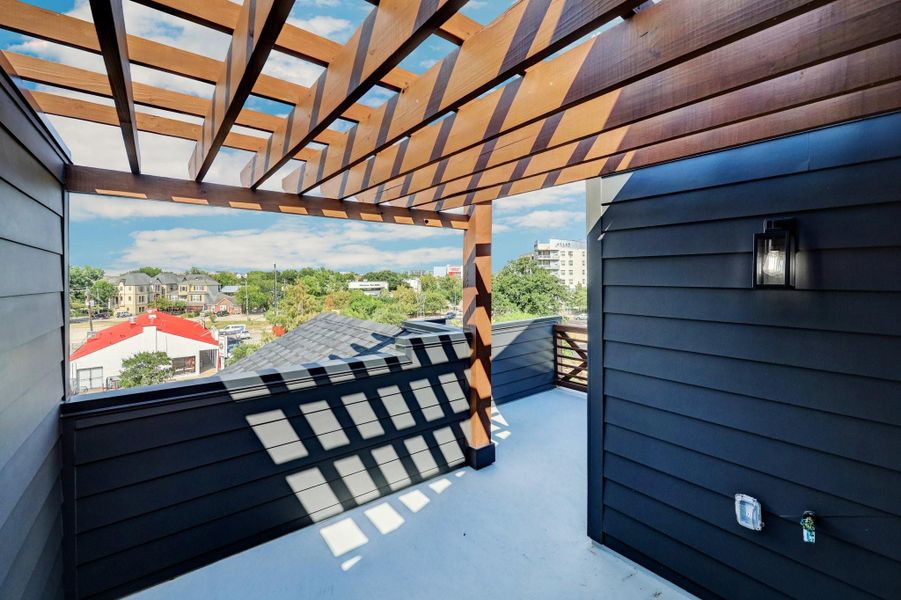 Wood trellis covered Roofttop terrace with gas and water access.