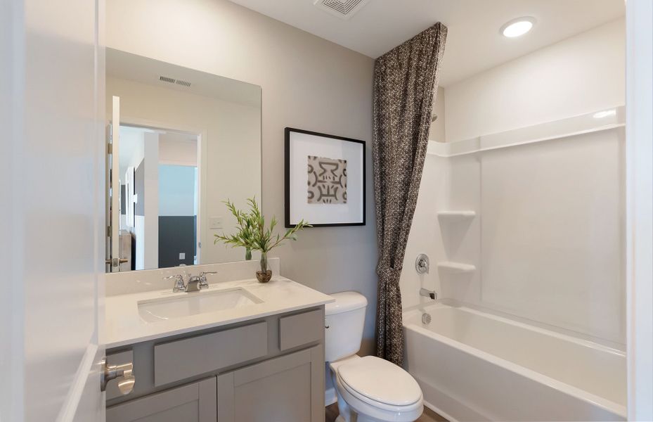 Furnished interior view inside a new home in Highlands of Carter's Station, Columbia (Image 6). Furnished interior view inside a new home in Highlands of Carter's Station, Columbia (Image 6).