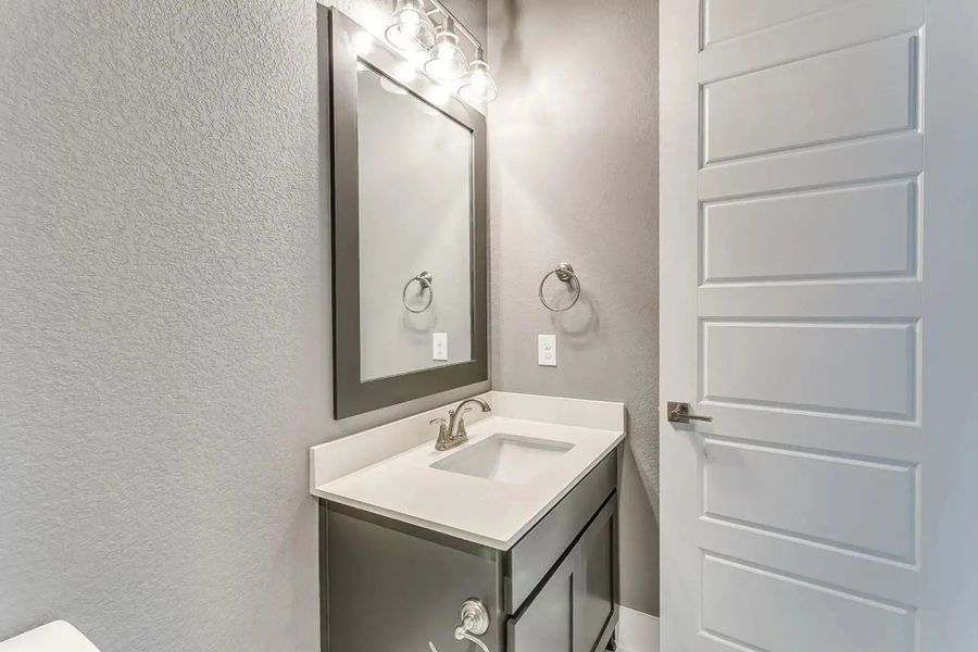 Representative furnished interior of a home built from the The Carter by Elmwood Custom Homes in Ranch at Stone Hill, Waxahachie (Image 12).