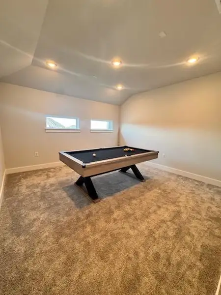 Rec room featuring billiards table, carpet floors, lofted ceiling, and recessed lighting