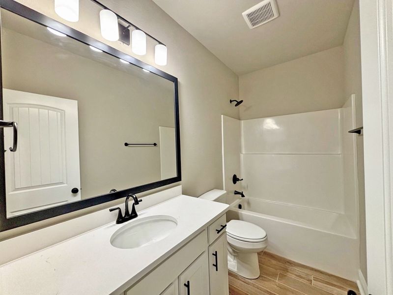 Furnished interior view inside a new home in Natureview, Freeport (Image 15).