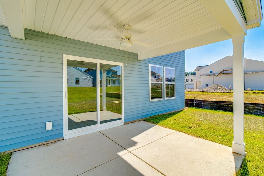 Front exterior of a new home in Winston Point, Gilbert, SC, highlighting curb appeal (Image 19).