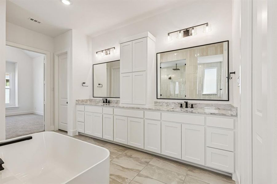 You'll find ample room for two in this gorgeous owner's bath!