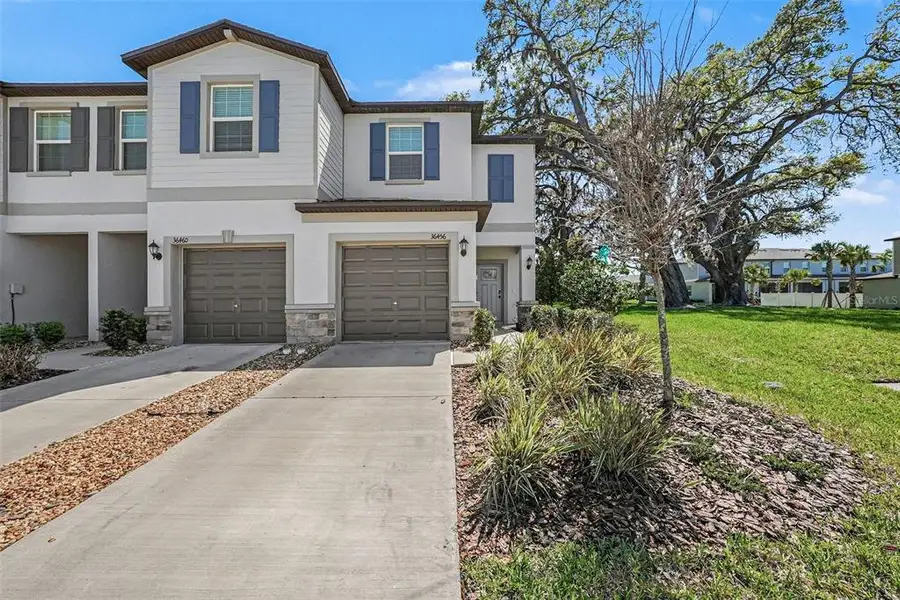 Front exterior of a new home in , Zephyrhills, FL, highlighting curb appeal (Image 17).