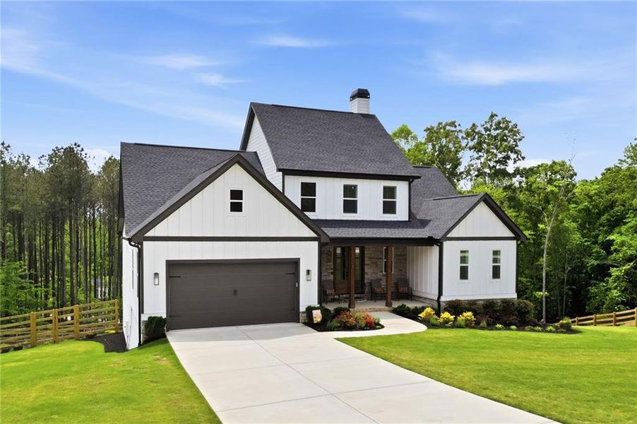 Front exterior of a new home in , Canton, GA, highlighting curb appeal (Image 23).
