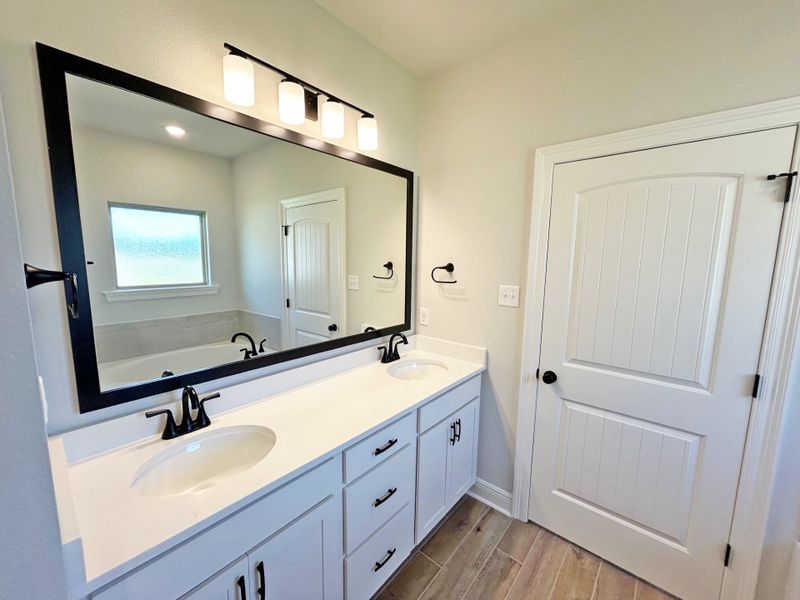 Furnished interior view inside a new home in The Bluffs at Lafayette, Freeport (Image 13).