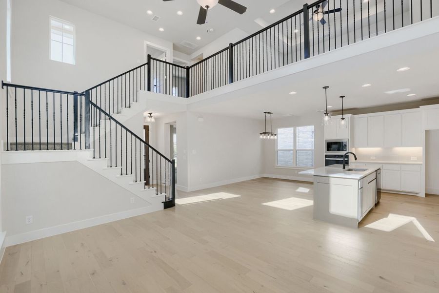 Plan 1604 Representative Photo of Staircase, Kitchen, Dining Plan 1604 Representative Photo of Staircase, Kitchen, Dining
