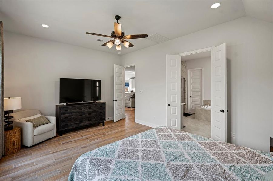 Another view of the primary bedroom