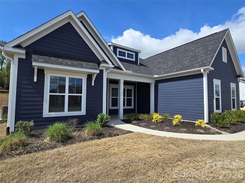 Front exterior of a new home in Red Hill, Concord, NC, highlighting curb appeal (Image 19). Front exterior of a new home in Red Hill, Concord, NC, highlighting curb appeal (Image 19).