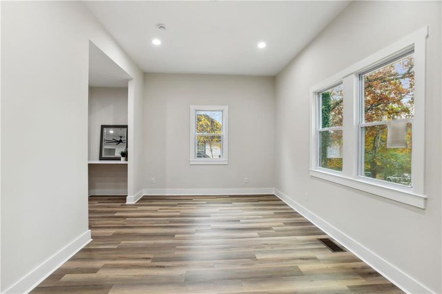 Unfurnished room with Luxury Vinyl Plank flooring