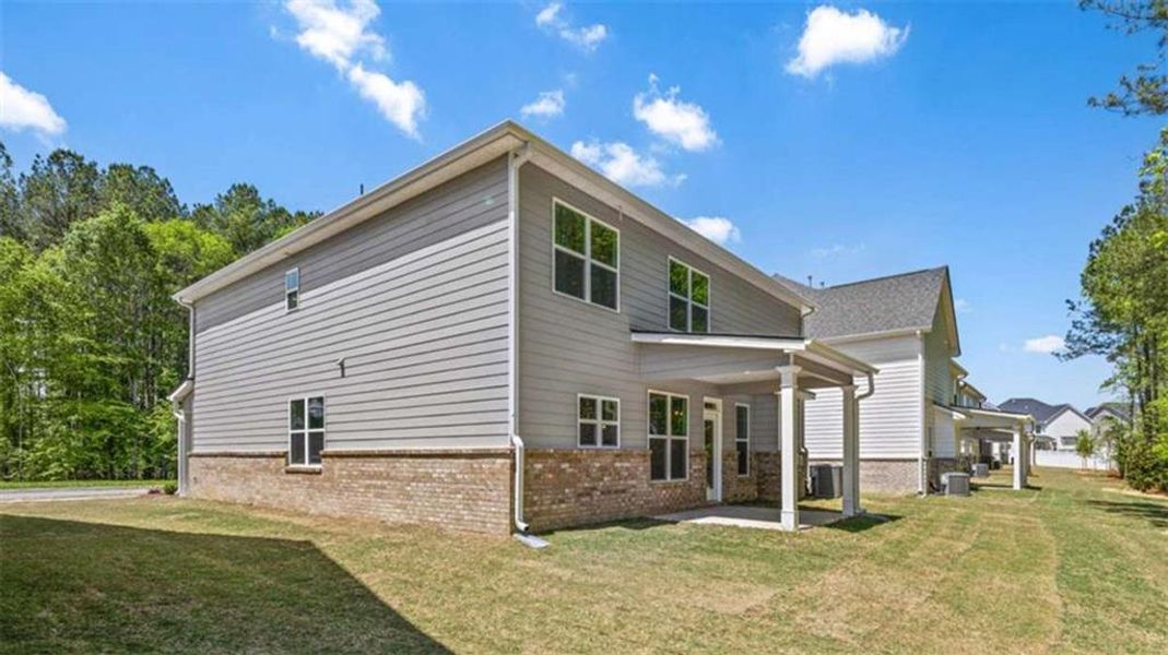Exterior details and patio area of a home in Wildwood, Covington (Image 23).
