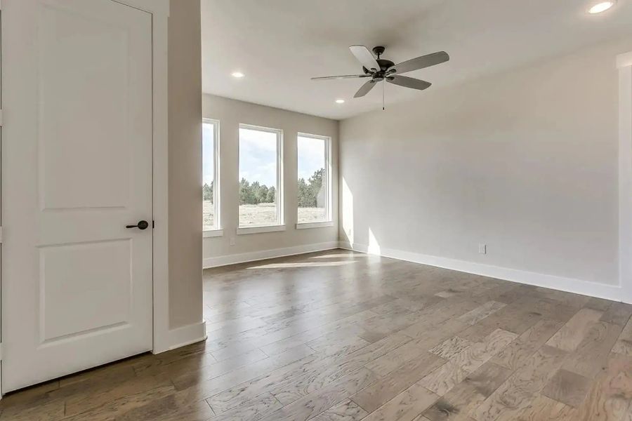 Representative unfurnished interior of a home built from the The Carter by Elmwood Custom Homes in Ranch at Stone Hill, Waxahachie (Image 24).