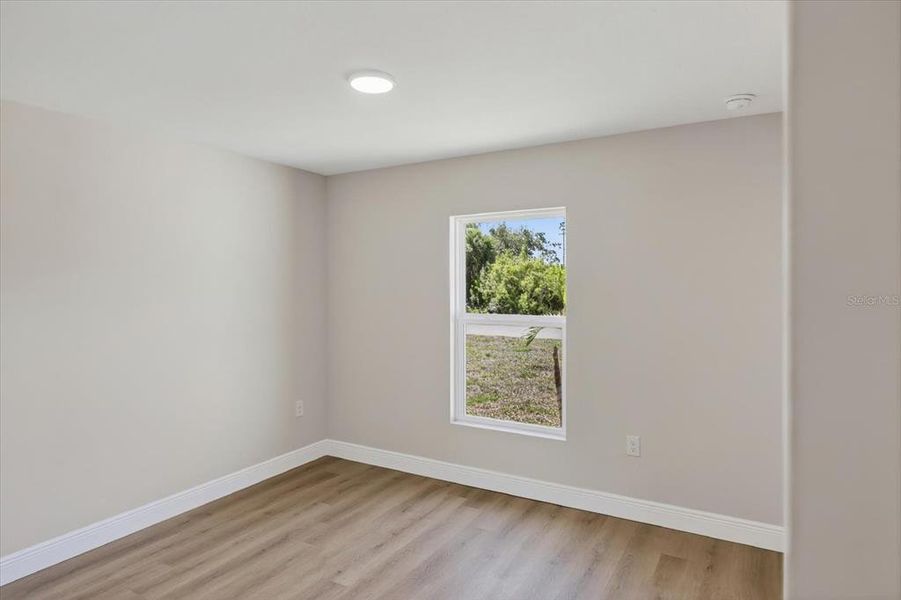 Spacious, unfurnished interior of a new home in , Port Charlotte (Image 16).