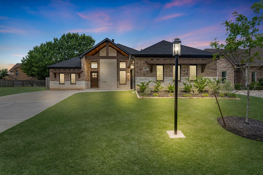 Home features fantastic curb appeal with brick and stone elevation. Home features fantastic curb appeal with brick and stone elevation.