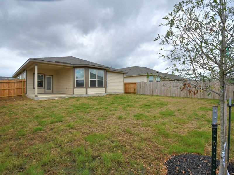 Exterior details and patio area of a home in Thomas Pond, San Antonio (Image 17).