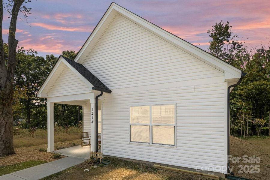 Front exterior of a new home in , Statesville, NC, highlighting curb appeal (Image 2). Front exterior of a new home in , Statesville, NC, highlighting curb appeal (Image 2).