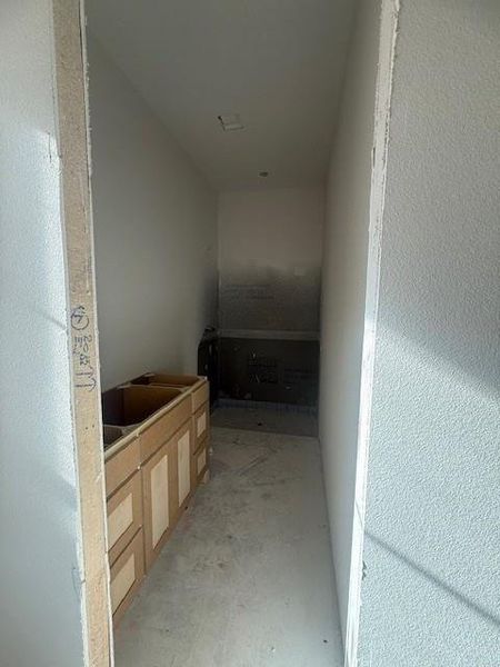 Ensuite bath with shower.