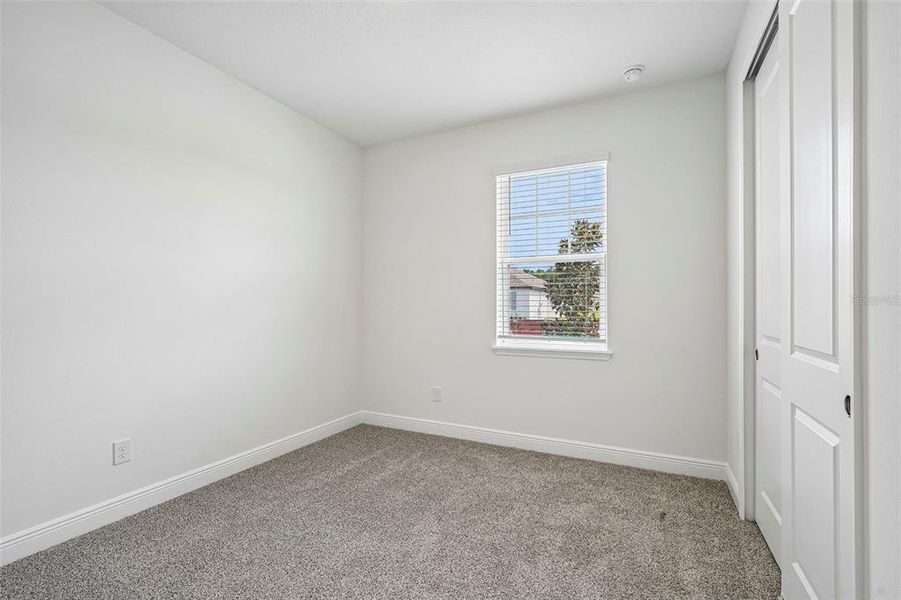 Spacious, unfurnished interior of a new home in Legends Preserve - Signature Series, Daytona Beach (Image 28).