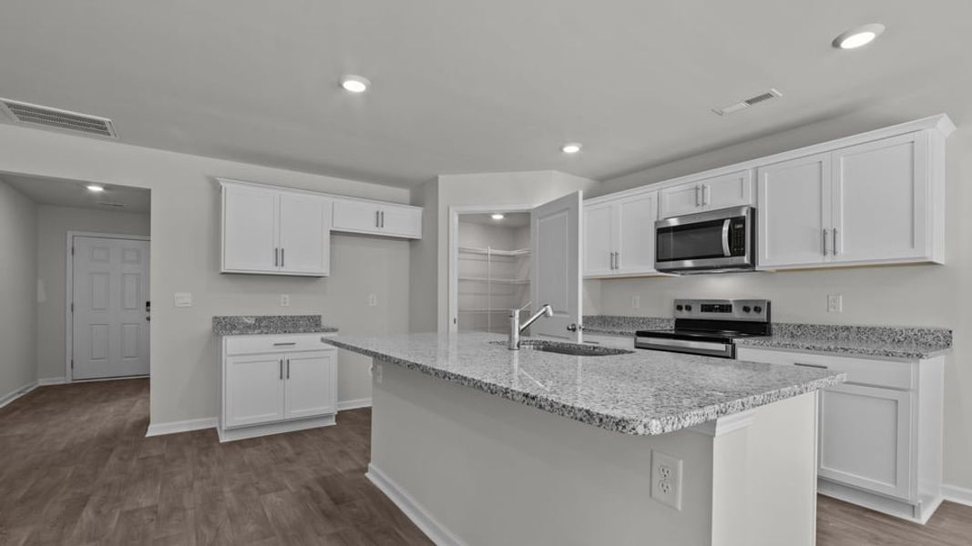 Furnished interior view inside a new home in Blair Ridge, La Grange (Image 6).
